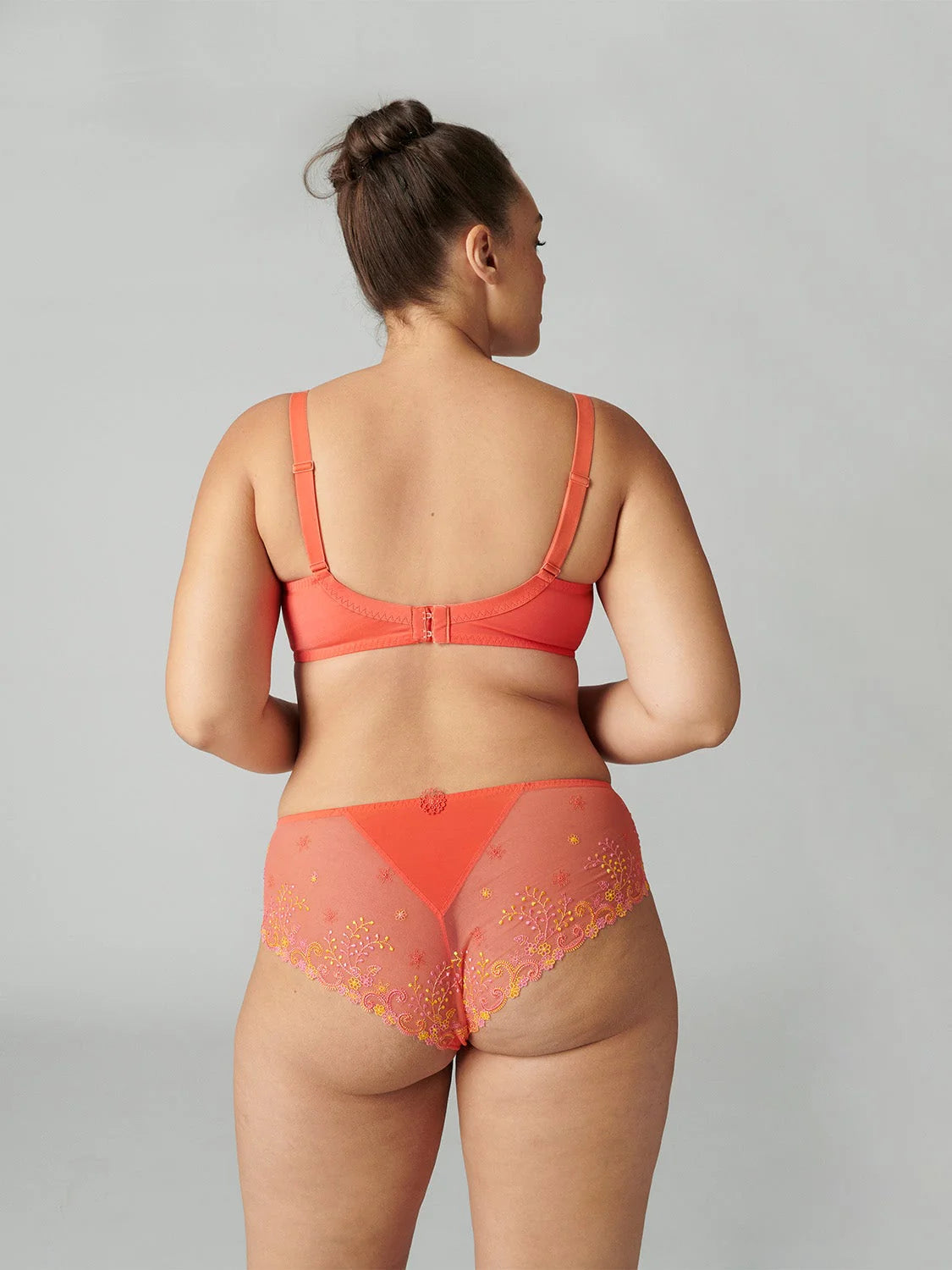 Women is wearing Delice Embroidered Shorty back picture with matching bra (sold separately)