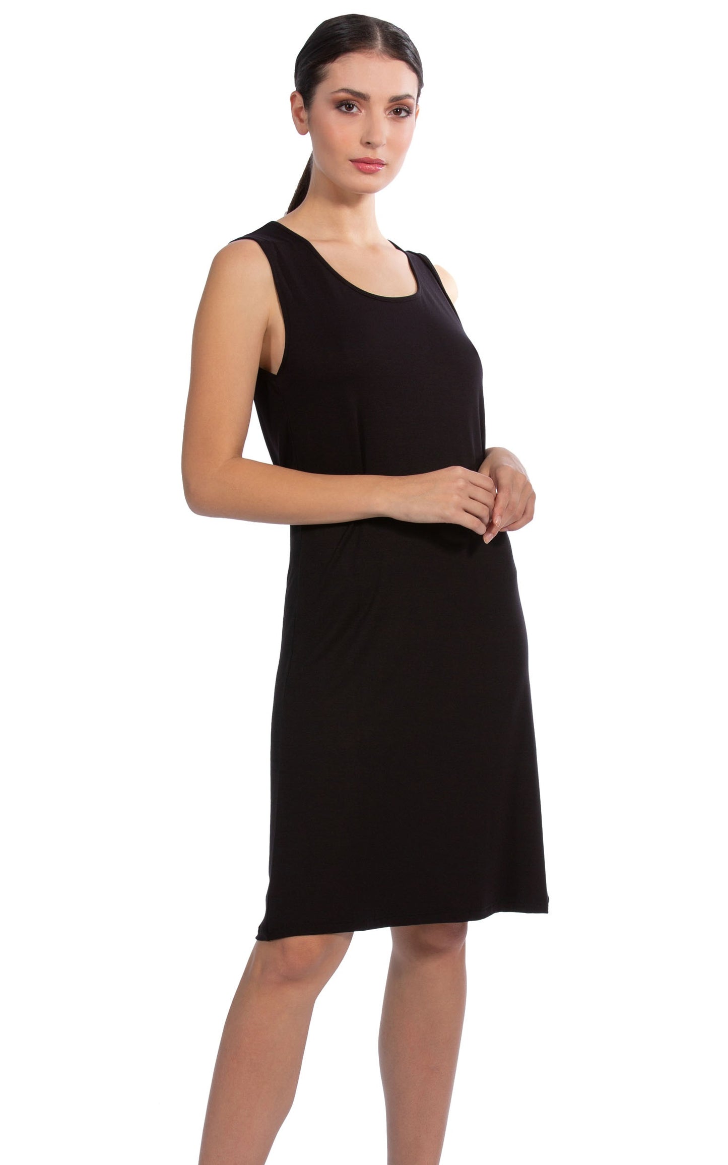 This Viscose line EGi dress from Italy boasts an ultra-soft, stretchy fabric with a silken look, as well as tasteful, sophisticated cross-back straps.