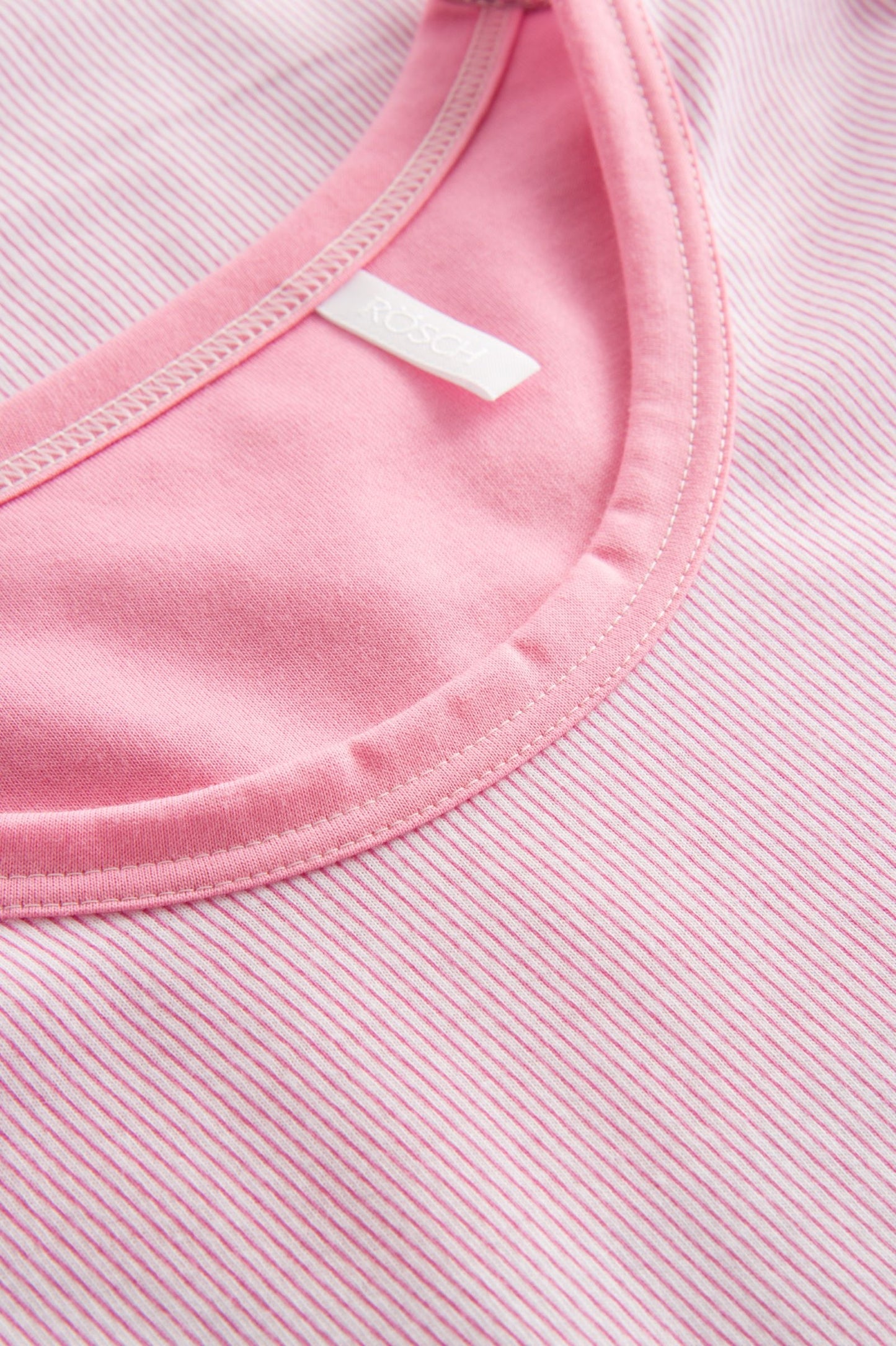 This nightgown from the Smart Casual line by Rösch features a lightweight, soft, and fine-striped jersey cotton fabric that ensures breathability, smoothness, and durability.