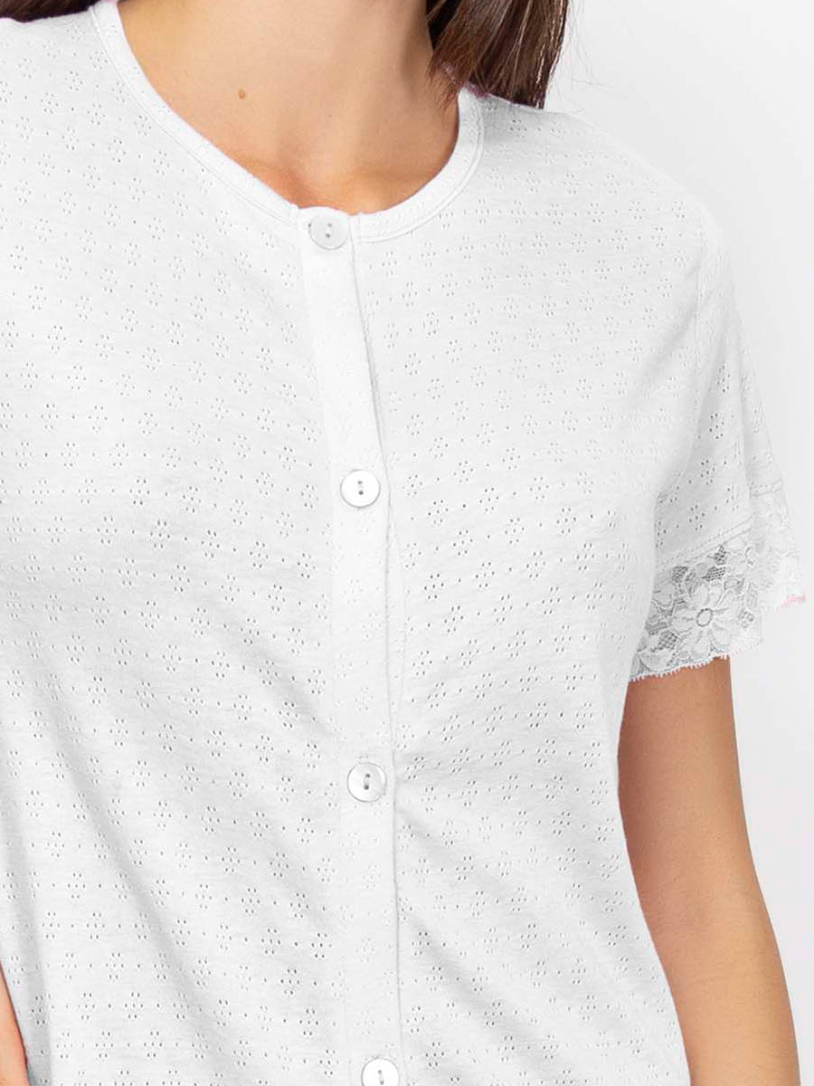 This housecoat is crafted from fine pointelle cotton for a smooth touch and subtle texture.