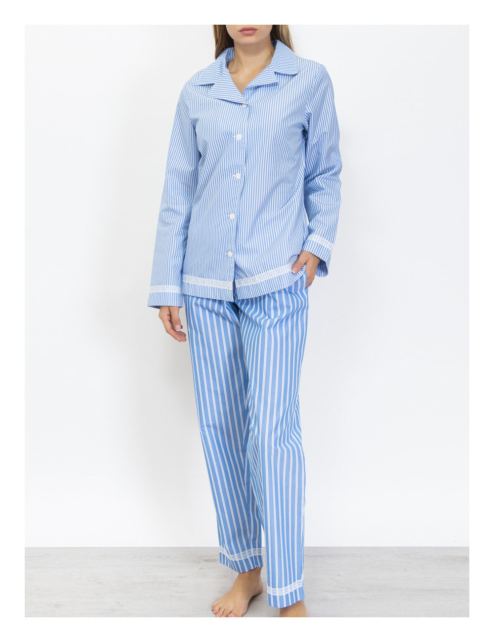 This Verdissima pajama set features a combination of male and female styling, with a button-up shirt top and long pants.