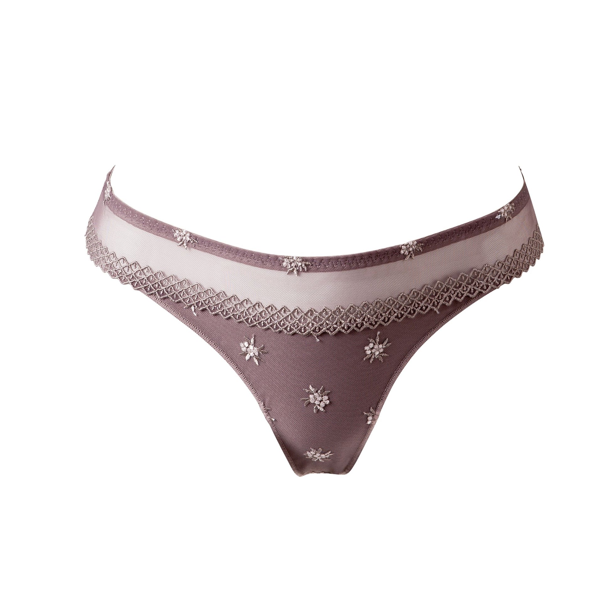 The Chantilly line by Louisa Bracq thong features a geometric border-line complemented by shimmering iridescent medallions, providing a sophisticated and refined air.