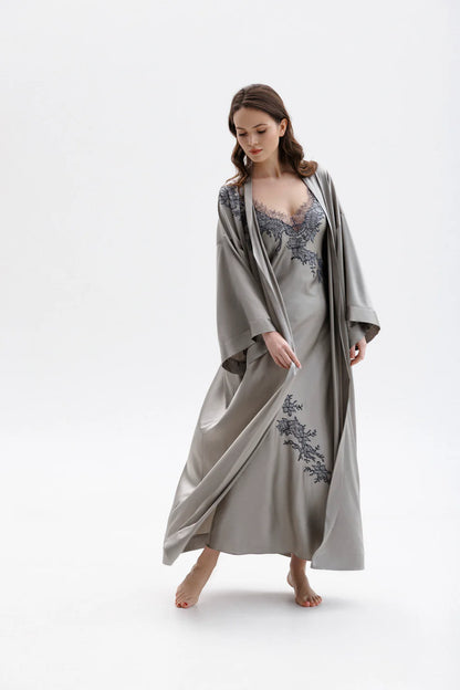 Woman wearing a silver silk sleeping  gown with floral embroidery showing the full figure picture with matching peignoir (sold separately)