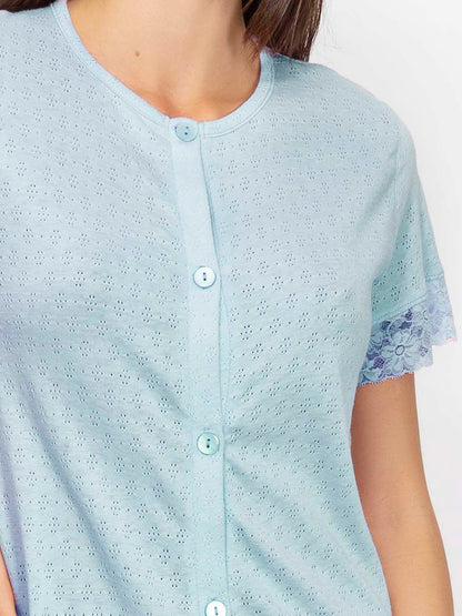 This housecoat is crafted from fine pointelle cotton for a smooth touch and subtle texture.