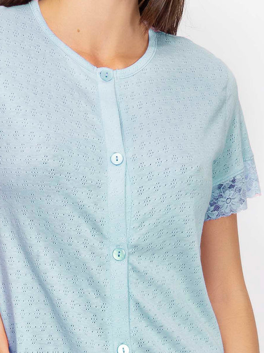 This housecoat is crafted from fine pointelle cotton for a smooth touch and subtle texture.