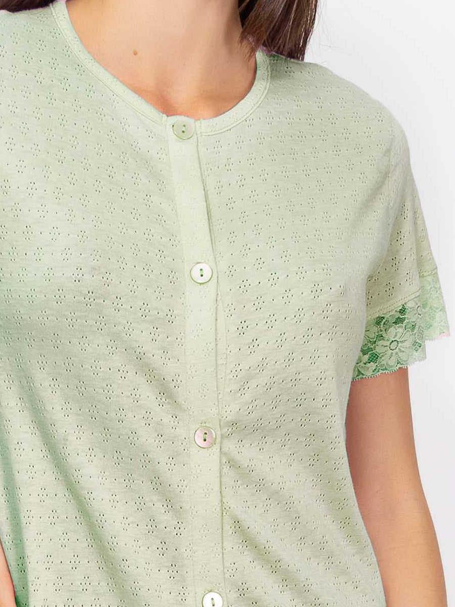 This housecoat is crafted from fine pointelle cotton for a smooth touch and subtle texture.