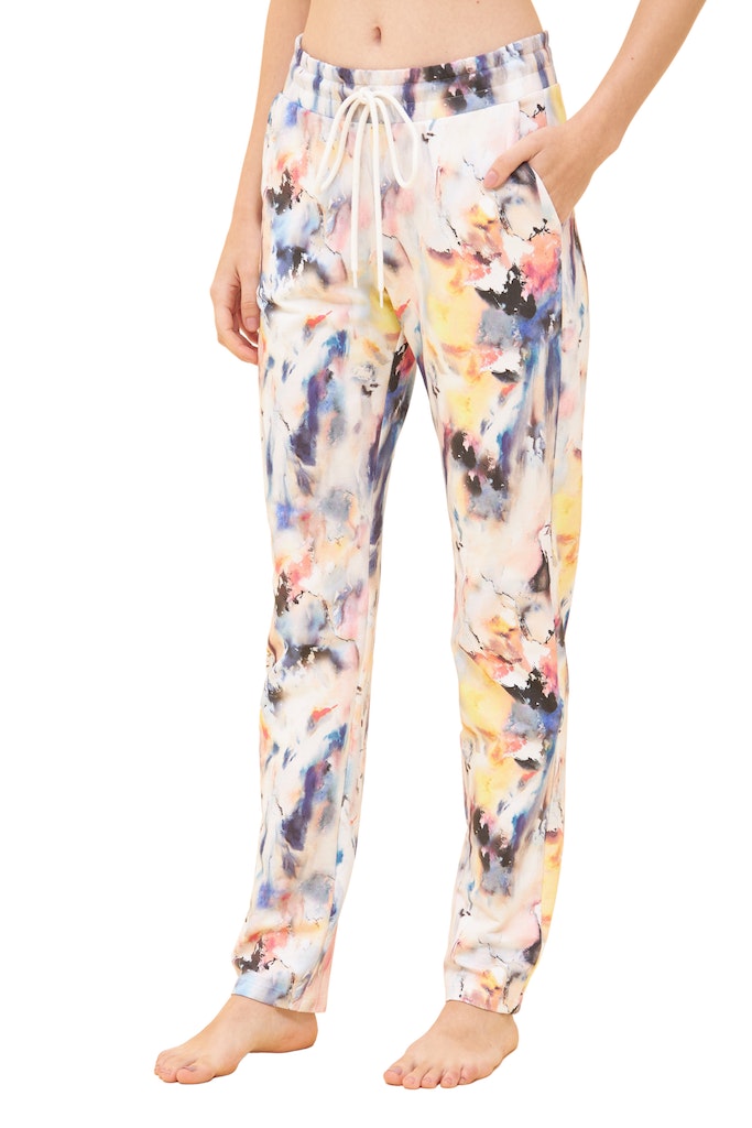 Model is wearing Thx Pastel Watercolour Print Sweatpants front picture
