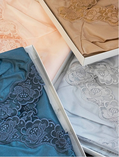 Wide straps, embroidered lace slip by Andra, made in Italy, at Di Moda Lingerie Toronto.