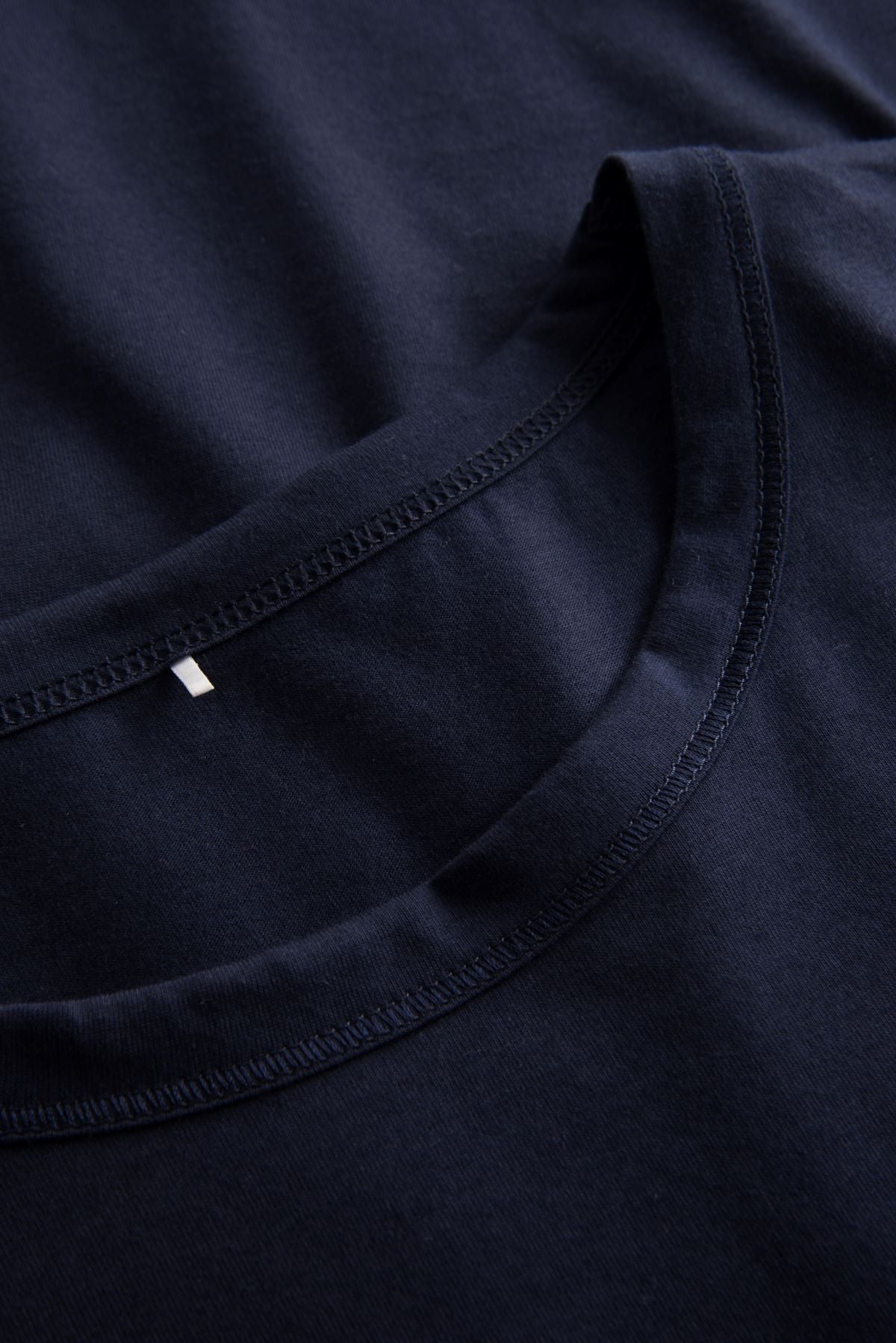 This two-piece pajama set from Rösch's Smart Casual collection is crafted from lightweight, supple single jersey cotton fabric, boasting a solid colored top and capri pants embellished with an indigo floral print.  Short sleeve  Wide crew-neck