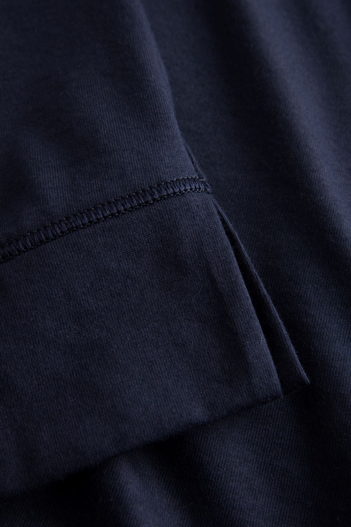 This two-piece pajama set from Rösch's Smart Casual collection is crafted from lightweight, supple single jersey cotton fabric, boasting a solid colored top and capri pants embellished with an indigo floral print.  Short sleeve  Wide crew-neck