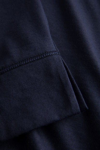 This two-piece pajama set from Rösch's Smart Casual collection is crafted from lightweight, supple single jersey cotton fabric, boasting a solid colored top and capri pants embellished with an indigo floral print.  Short sleeve  Wide crew-neck