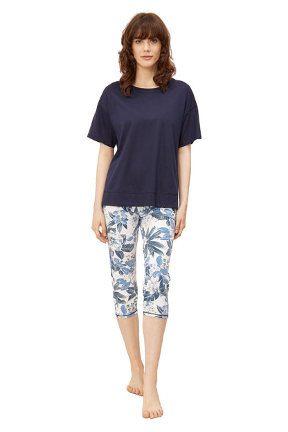 This two-piece pajama set from Rösch's Smart Casual collection is crafted from lightweight, supple single jersey cotton fabric, boasting a solid colored top and capri pants embellished with an indigo floral print.  Short sleeve  Wide crew-neck