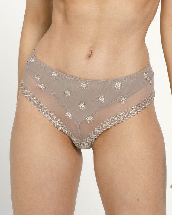 The Brazilian Shorty from the Chantilly line by Louisa Bracq offers a sleek, refined look through its geometric leg-lines and accompanying stunningly iridescent medallions.